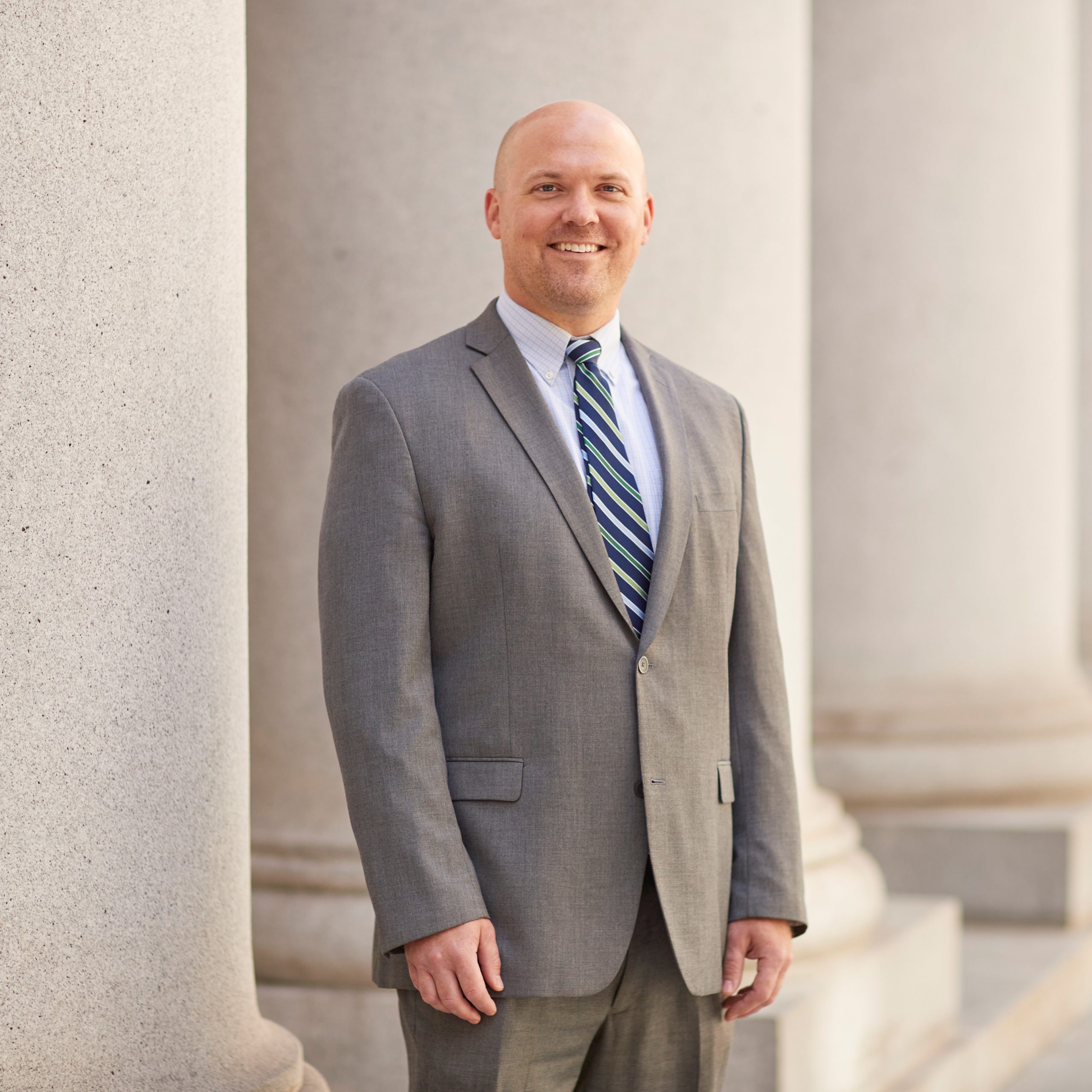 Jason Hopper Family Attorney standing on court steps